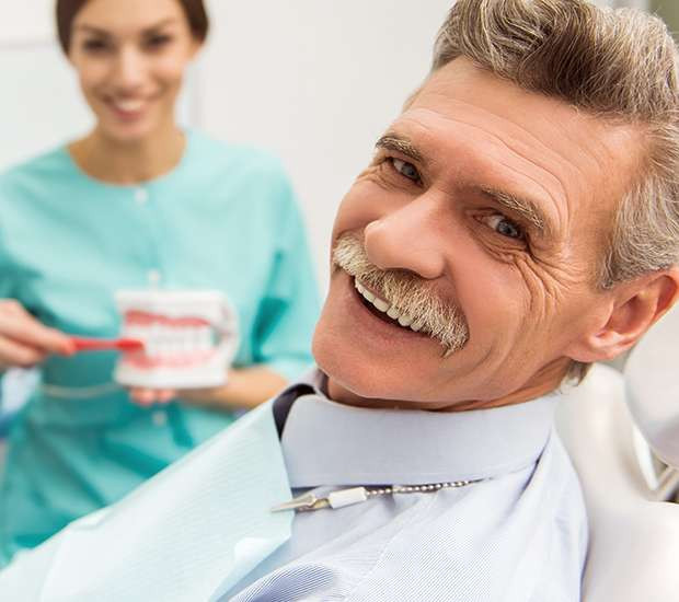 Smiling man at dental appointment